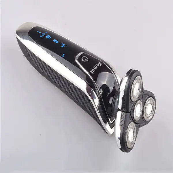The Sovereign™ 4-Blade Rechargeable Grooming System  Precision shaving engineered for the modern gentleman.