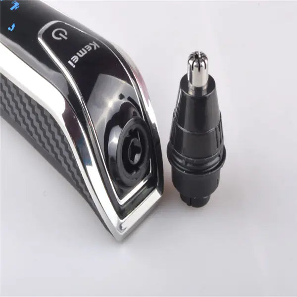 The Sovereign™ 4-Blade Rechargeable Grooming System  Precision shaving engineered for the modern gentleman.