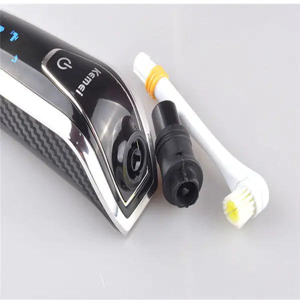 The Sovereign™ 4-Blade Rechargeable Grooming System  Precision shaving engineered for the modern gentleman.